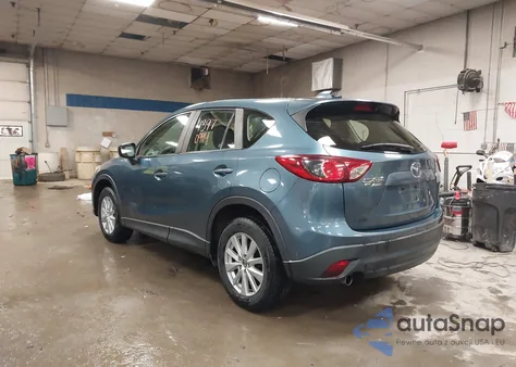 2015 Mazda Cx-5 Sport from USA, damaged, VIN JM3KE4BY5F0511417